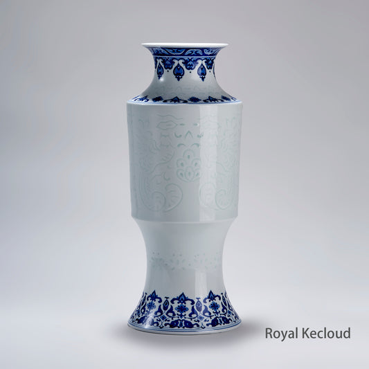 Phoenix-Tail Shaped Blue & White Porcelain Vase with scrolling floral designs and blue accents on the flared rim and foot.