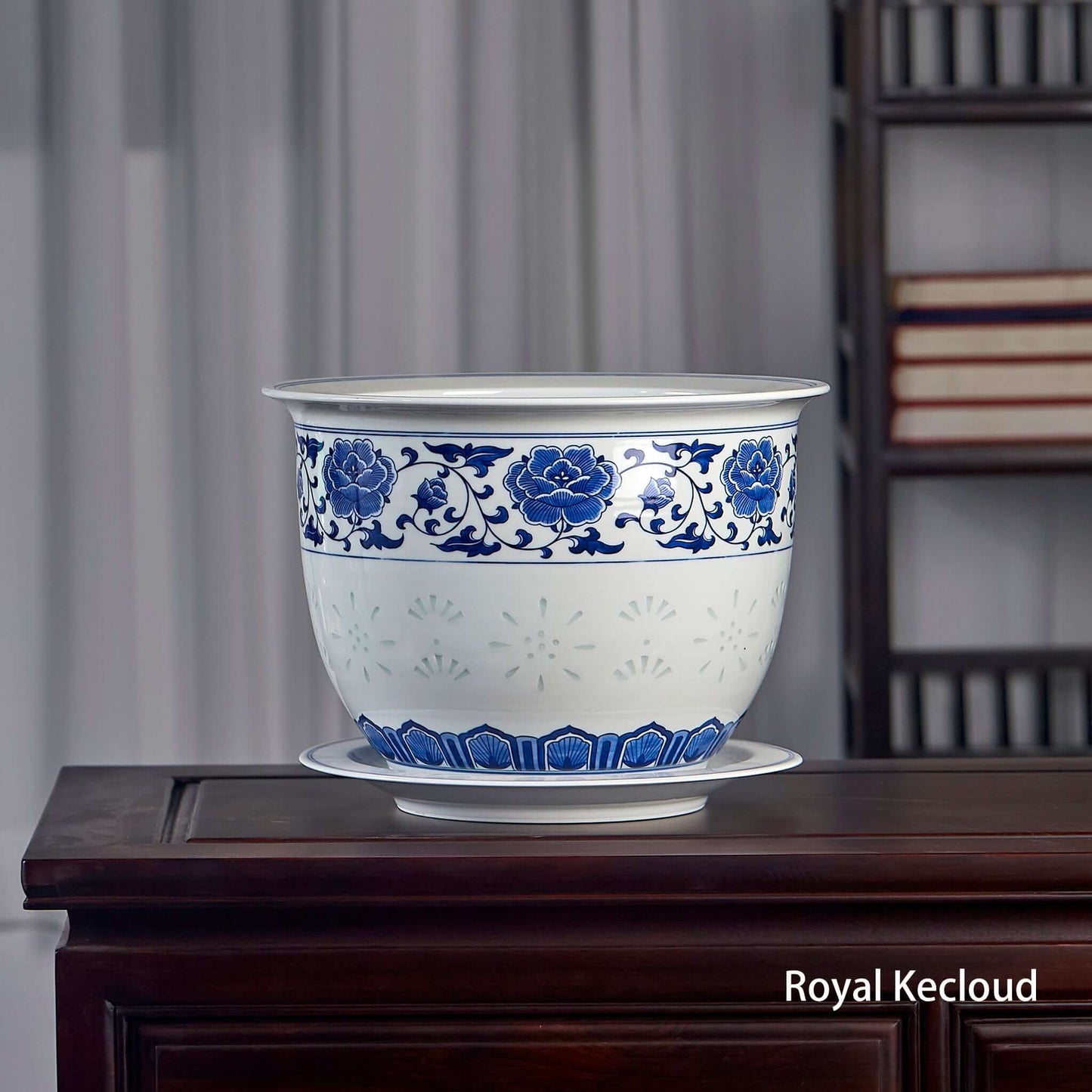 Blue and White Porcelain Jardinière displayed on a wooden table, showcasing elegant floral scrolls and cobalt brushwork.