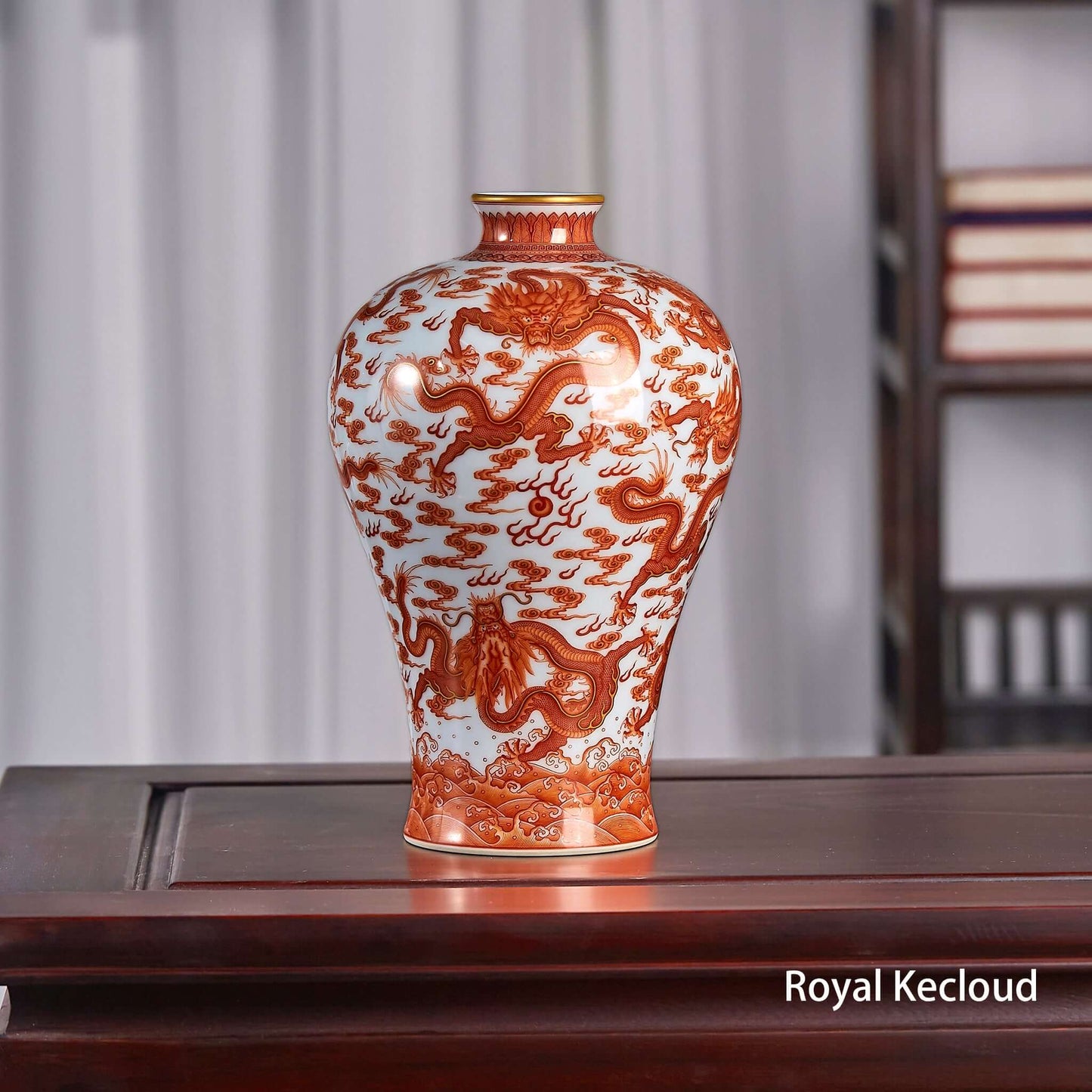 Imperial Porcelain Vase featuring intricate iron-red dragons and elegant meiping silhouette on a wooden table.