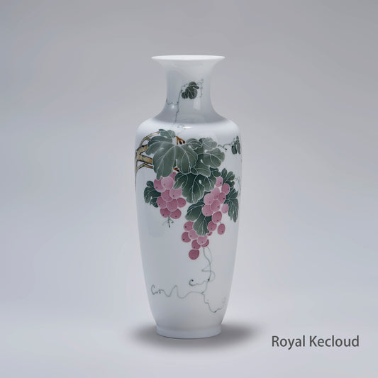 Ivory-like porcelain vase with grape motif – fine craftsmanship and contemporary design