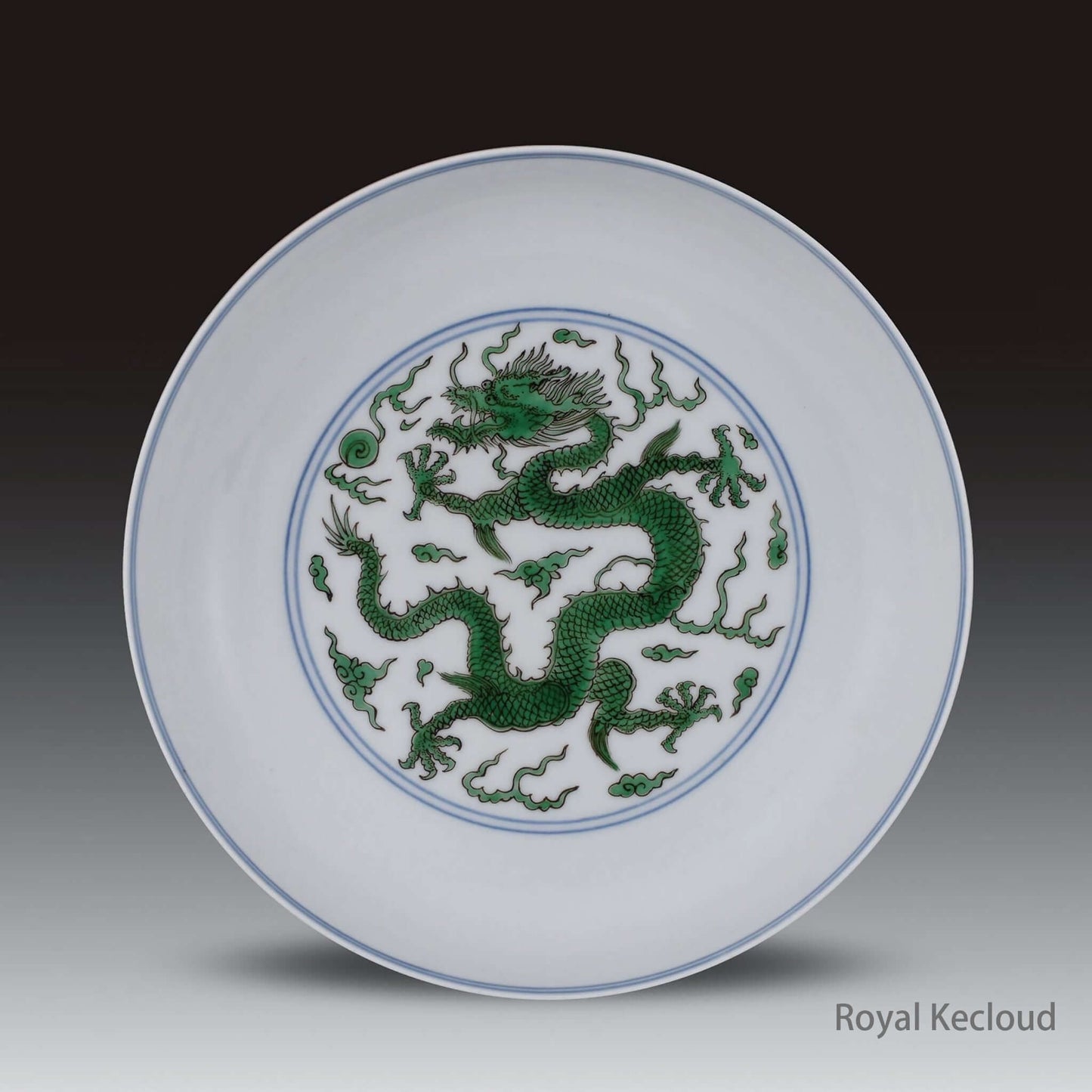 Chinese Ceramics Doucai Contrasting Colors Dish featuring an imperial dragon design on a luminous background.