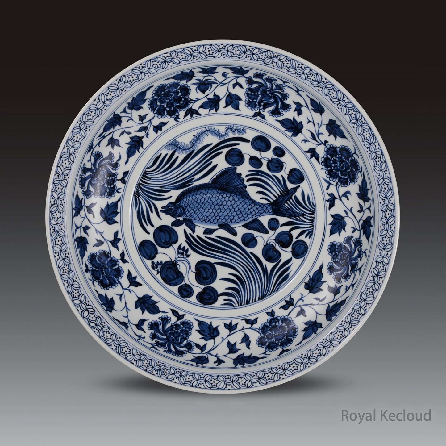 Chinese Ceramic Dish featuring a blue and white mandarin fish design from the Yuan Dynasty.