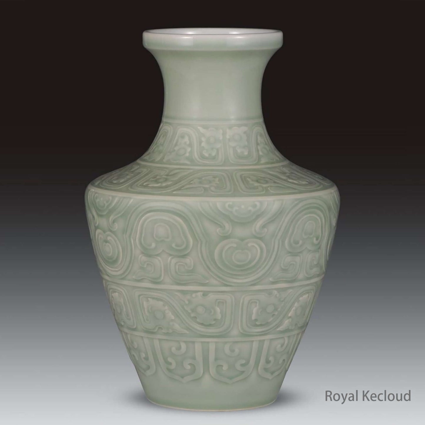 Celadon-Glazed Porcelain Vase in Zun form with intricate carvings from the Qing Dynasty, showcasing elegant celadon glaze.
