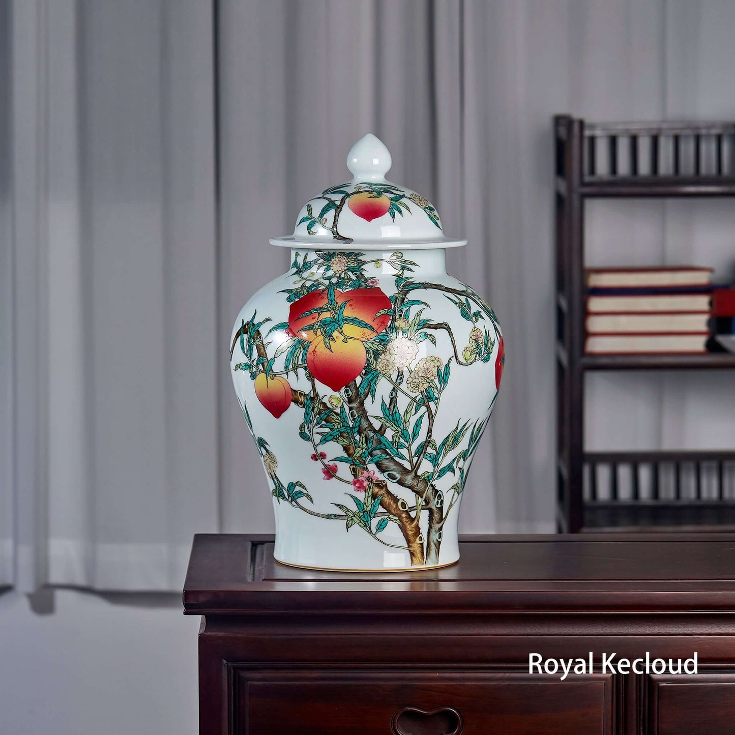 Famille Rose Ceramic Jar featuring vibrant peach motifs from the Qing Dynasty, showcasing exquisite craftsmanship and elegance.