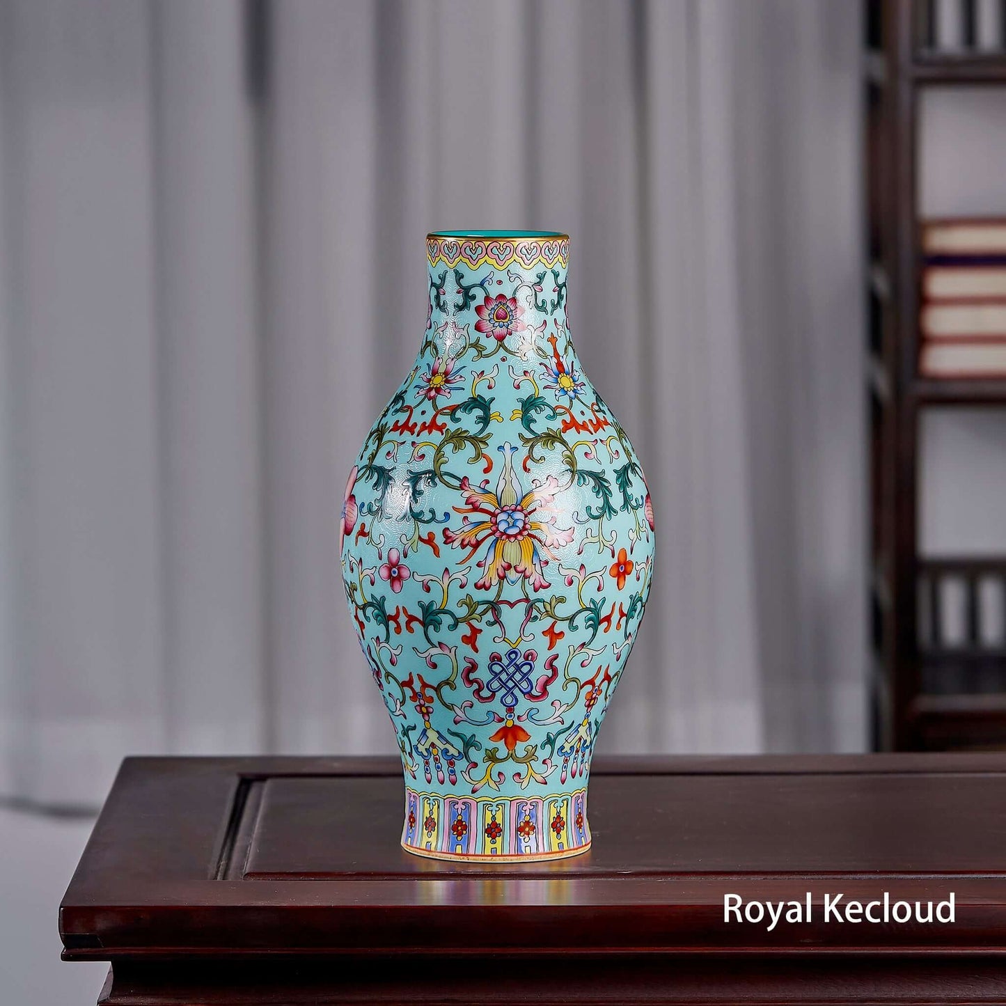 Imperial Porcelain Vase in turquoise ground with floral patterns, reflecting Qing Dynasty artistry.