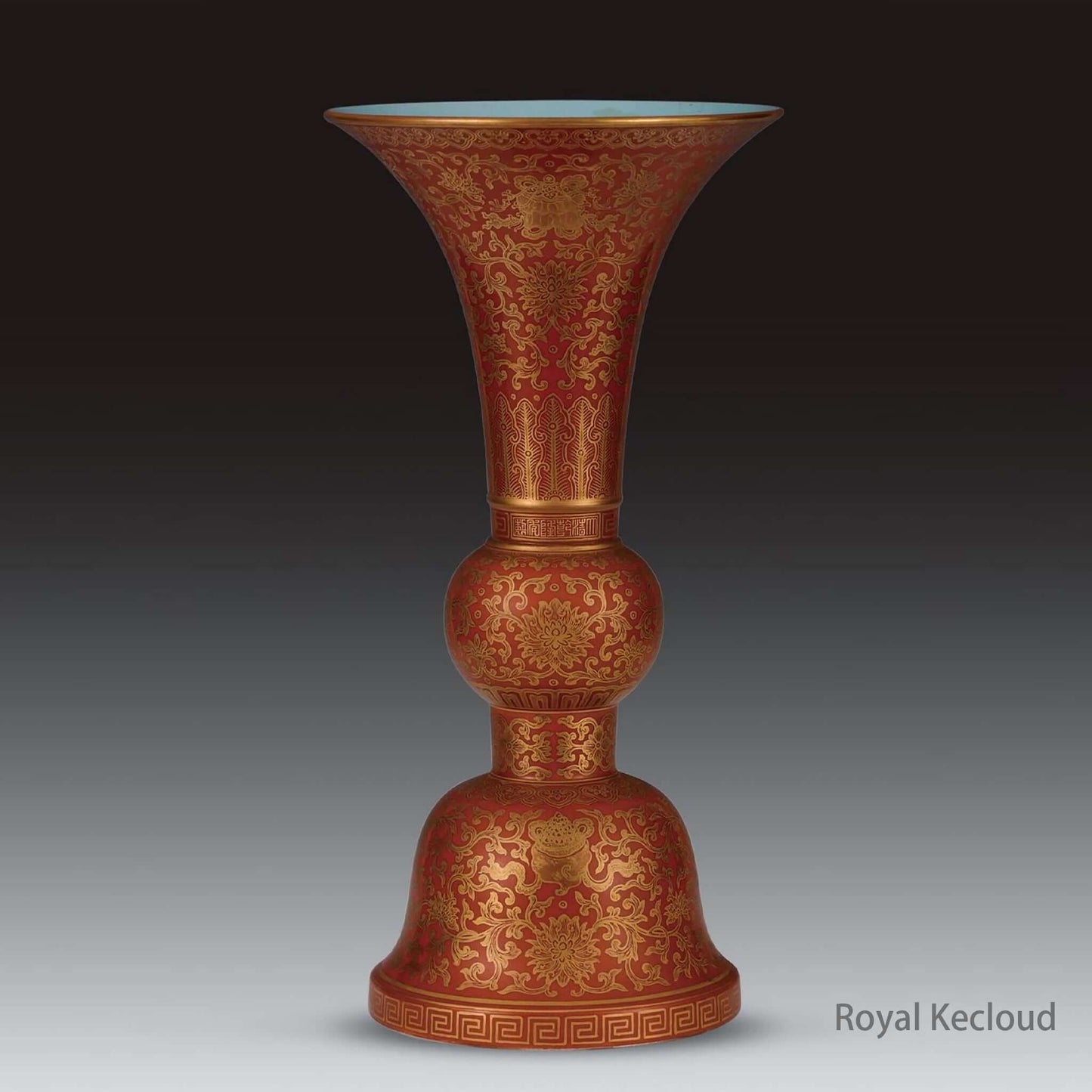 Gu-Form Porcelain Vase showcasing Qing Dynasty Qianlong artistry with elaborative designs on a coral-red background.