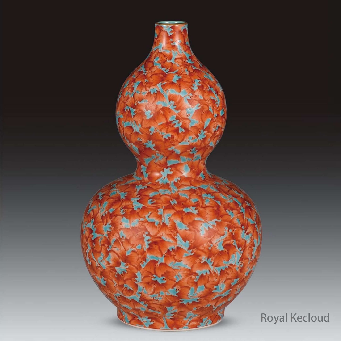 Imperial Ceramic Vase in Famille Rose Double-Gourd form featuring intricate floral designs and vivid colors.