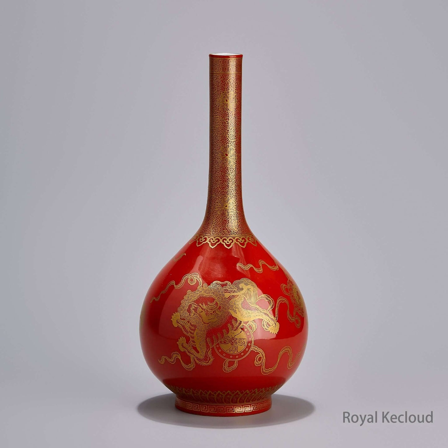 Imperial Porcelain Vase featuring a radiant alum-red ground and gilt-decorated lions, Qing Dynasty Qianlong craftsmanship.