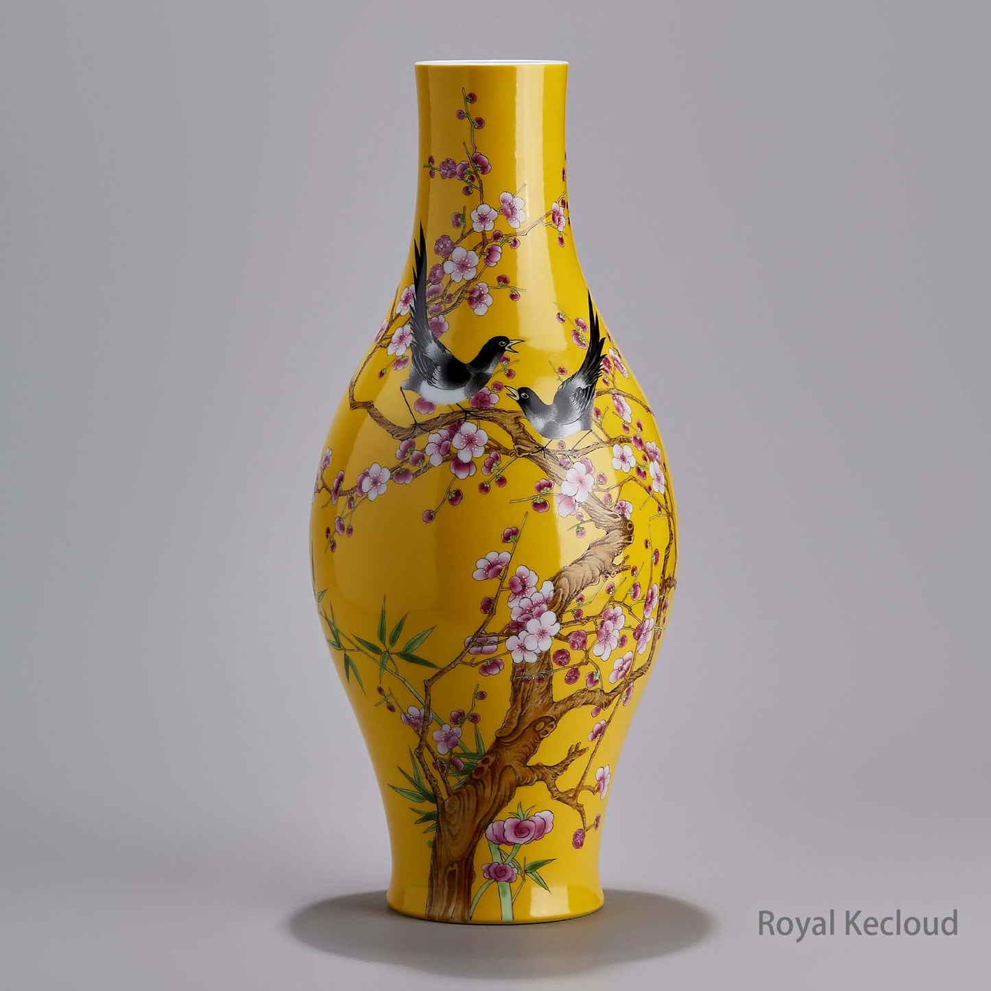Famille Rose Porcelain Vase showcasing prunus and magpies on a yellow ground, reflecting Qing Dynasty Yongzheng artistry.