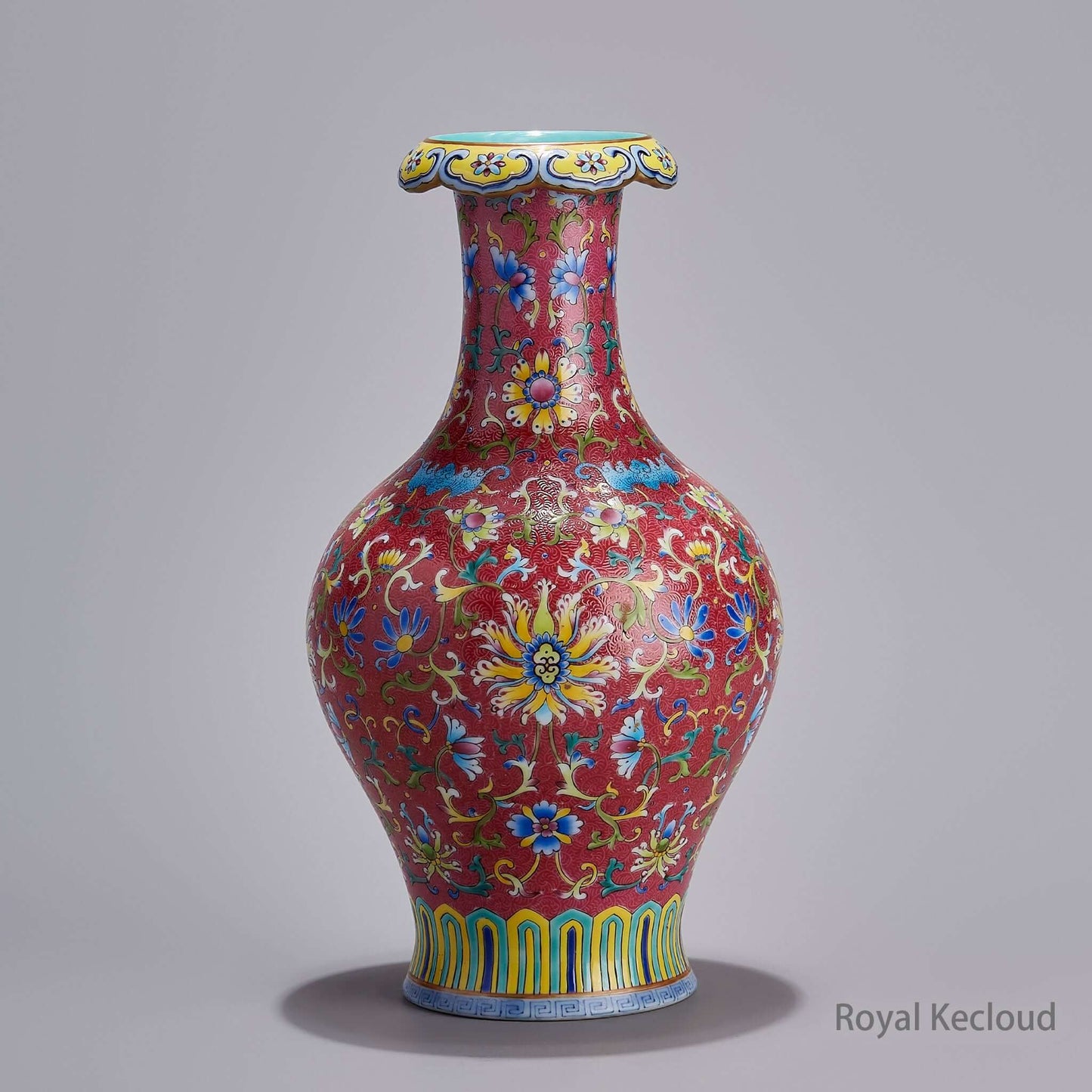 Chinese Ceramic Vase showcasing Red-Ground Interlocking Lotus design from the Qing Dynasty, featuring a striking cinnabar background.