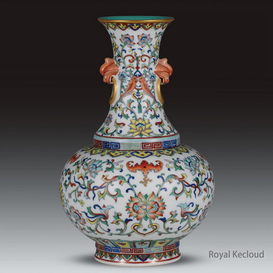 A Doucai 'Lotus' Baluster Vase with Figural Lugs