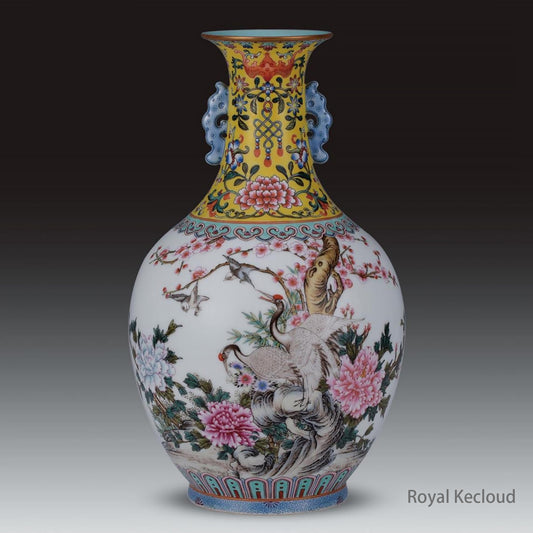 A Yellow-ground Famille Rose 'Florals and Cranes' Porcelain Vase with Two Handles