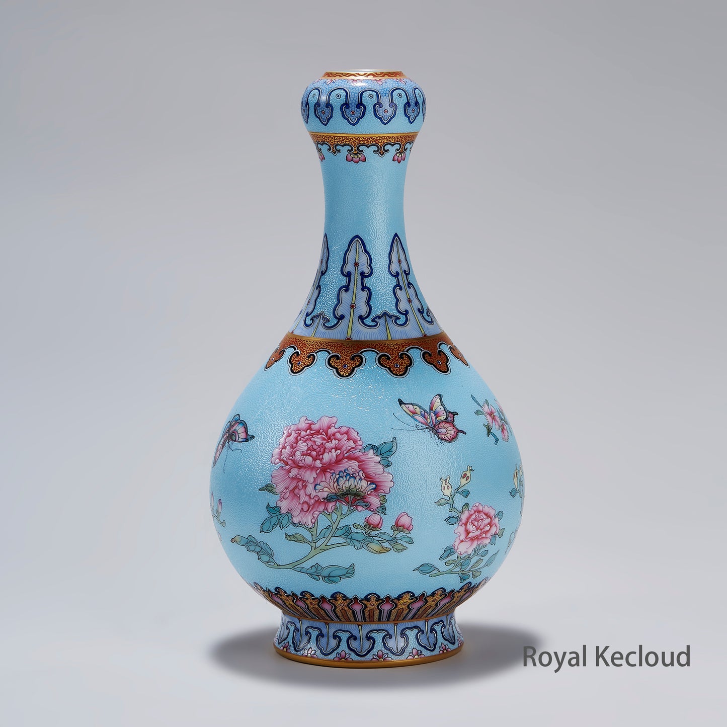 Chinese Qing Dynasty Imperial Celadon-ground Famille Rose 'Flowers and Butterflies' Garlic Head Vase