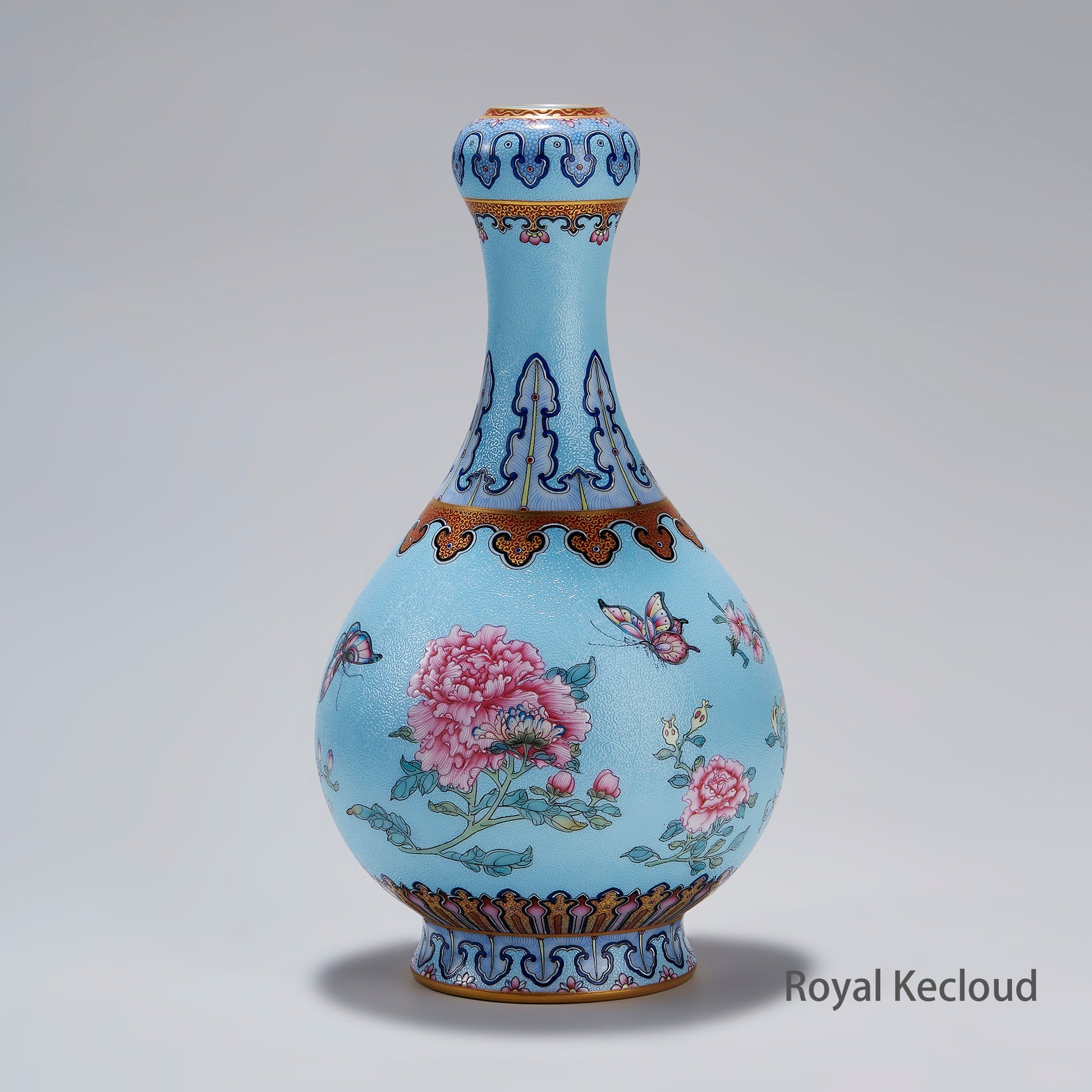 Chinese Qing Dynasty Imperial Celadon-ground Famille Rose 'Flowers and Butterflies' Garlic Head Vase