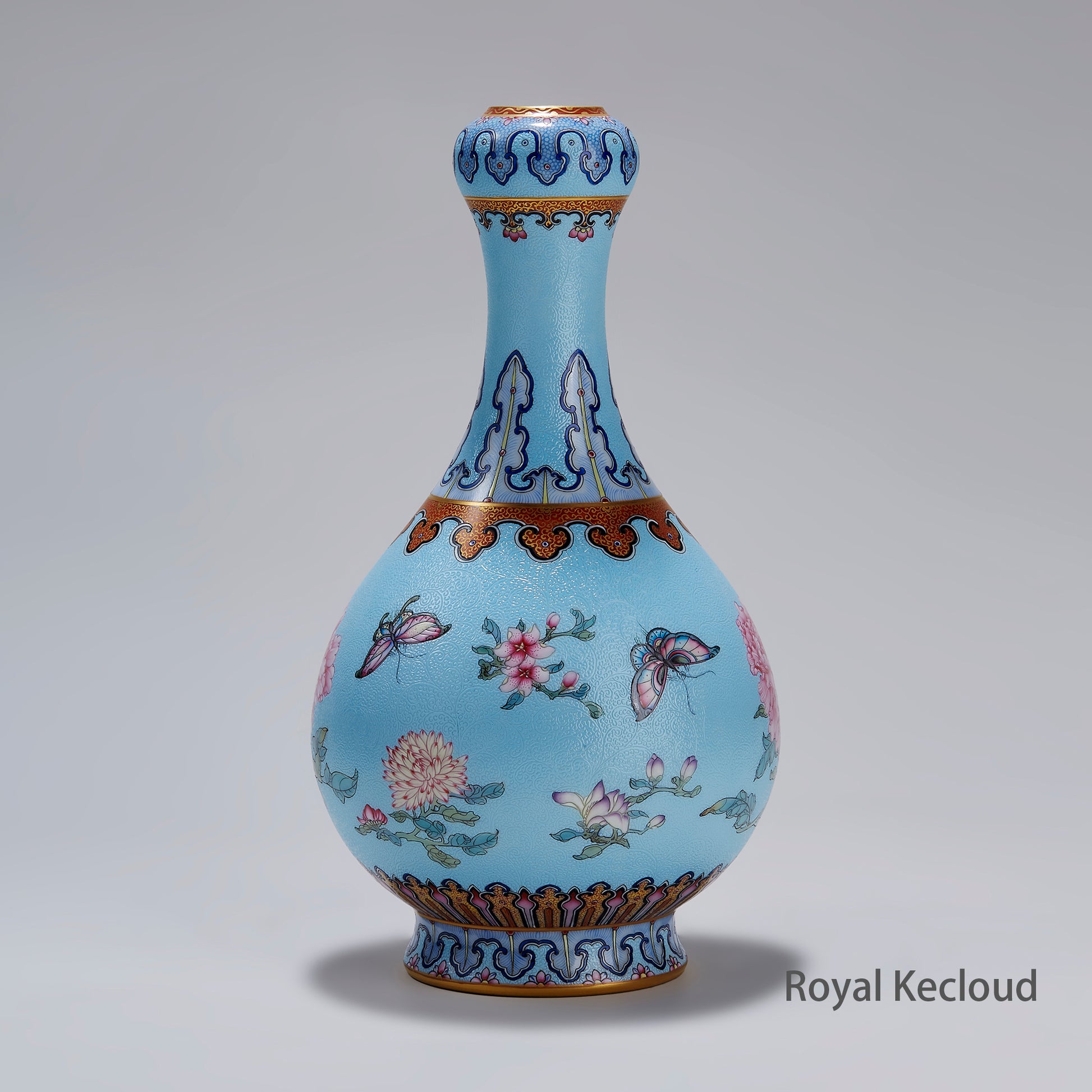 Chinese Qing Dynasty Imperial Celadon-ground Famille Rose 'Flowers and Butterflies' Garlic Head Vase
