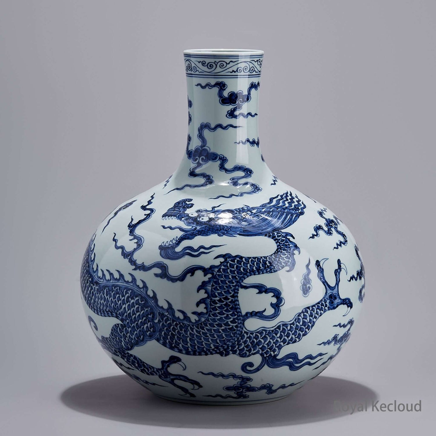 Blue and White Globe Vase featuring a Dragon Among Clouds motif, showcasing Ming Dynasty craftsmanship.